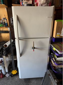 Refrigerator with keg dispenser tap