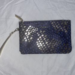 This is a Monat wristlet clutch bag