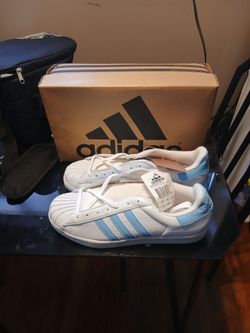 Adidas shoes 10 and a half brand new never used
