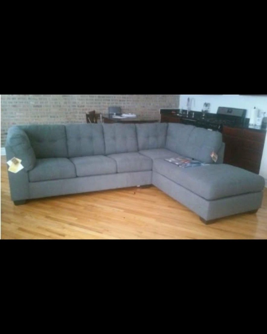 GREY CHASE SOFA W/ LET OUT BED