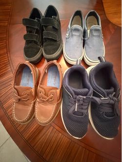 A bundle of boys, vans, topsiders, and sneakers
