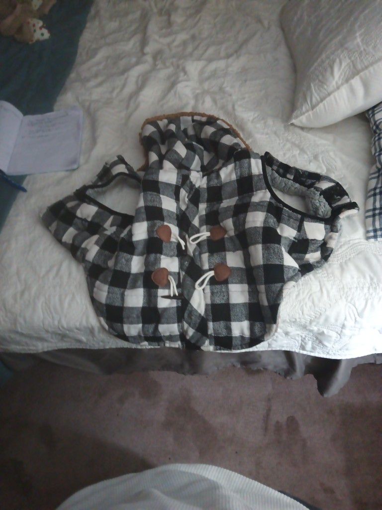 A Very Nice Dog Jacket That Has A Checkered Outside And A Wall Inside Very Nice And For Large Dogs