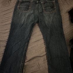 Clean Dark Washed  Ariat Denim FR M4 Low Rise Boot Cut jeans