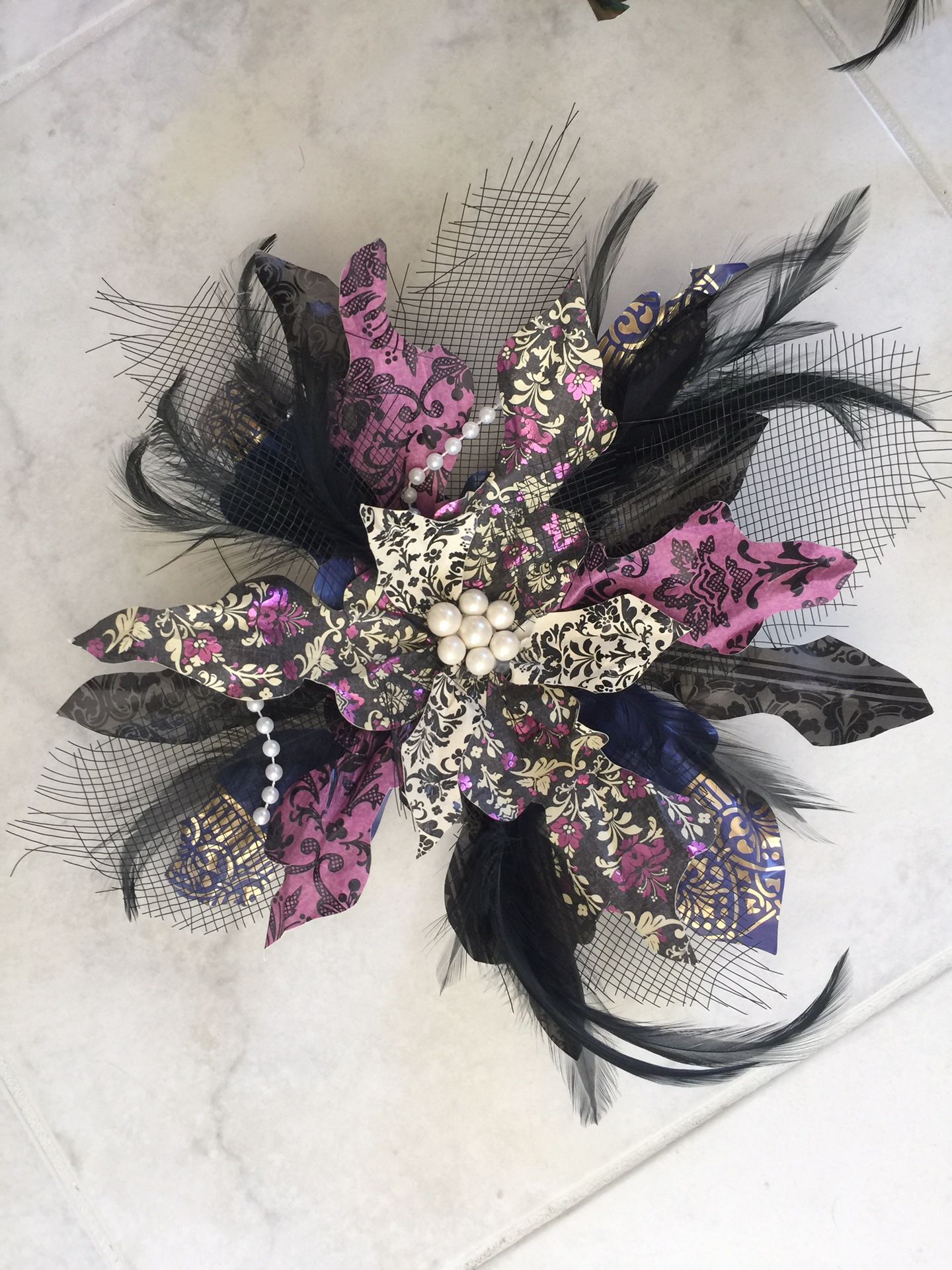 Decorations. Party. Feather. Pearl. Paper pinwheels