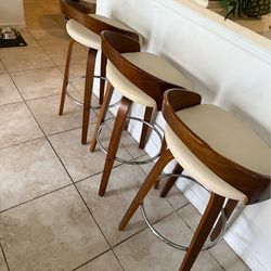 3 Brown and beige bar stools