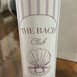 tumbler featuring a coastal "The Bach Club" seashell design. These insulated stainless steel travel mugs are heavily 