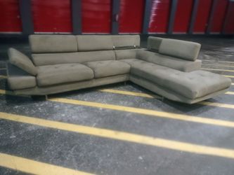 Free Delivery Today! Steam Cleaned ! Sectional couch with adjustable headrest and storage! Nice sofa!  No rips or stains