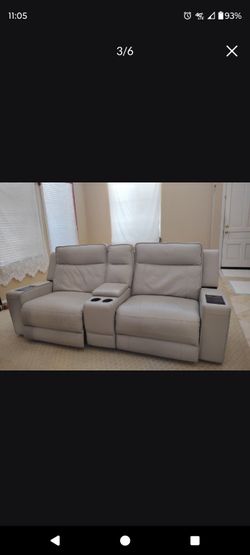 Leather couch with electric fireplace