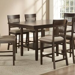 I'm selling a new 7-piece dining set.