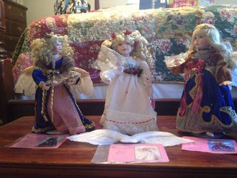 Like new porcelain angel doll collection. I'll come with accessories. Make an offer separately or together