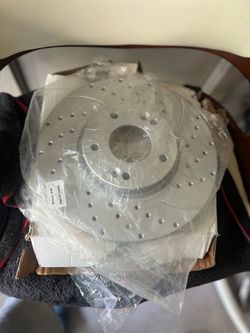 Slotted drilled rotors