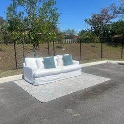 City furniture white slip covered couch