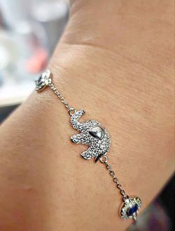 Elephant Clear and Blue Cubic Zirconia 18kt White Gold Plated Sterling Silver Bracelet.