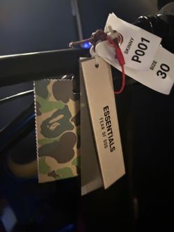 essentials and BAPE tags
