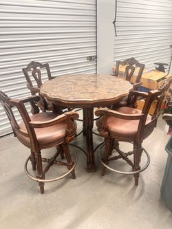 Marble top dining room table with chairs ￼
