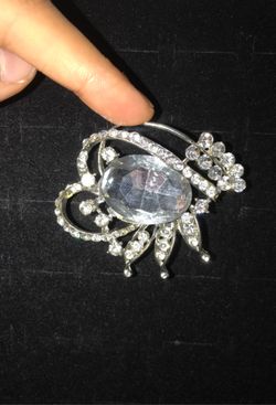 Silver Styling Pin has a Saftey pin attached on back