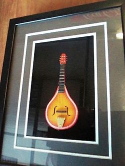 Miniature mandolin 7 in by 3 in