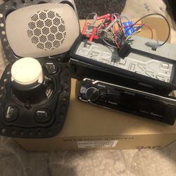 Kenwood Bluetooth radio with a plug and two speakers for the doors and roof of your car. Extras: Pandora, iHeart radio