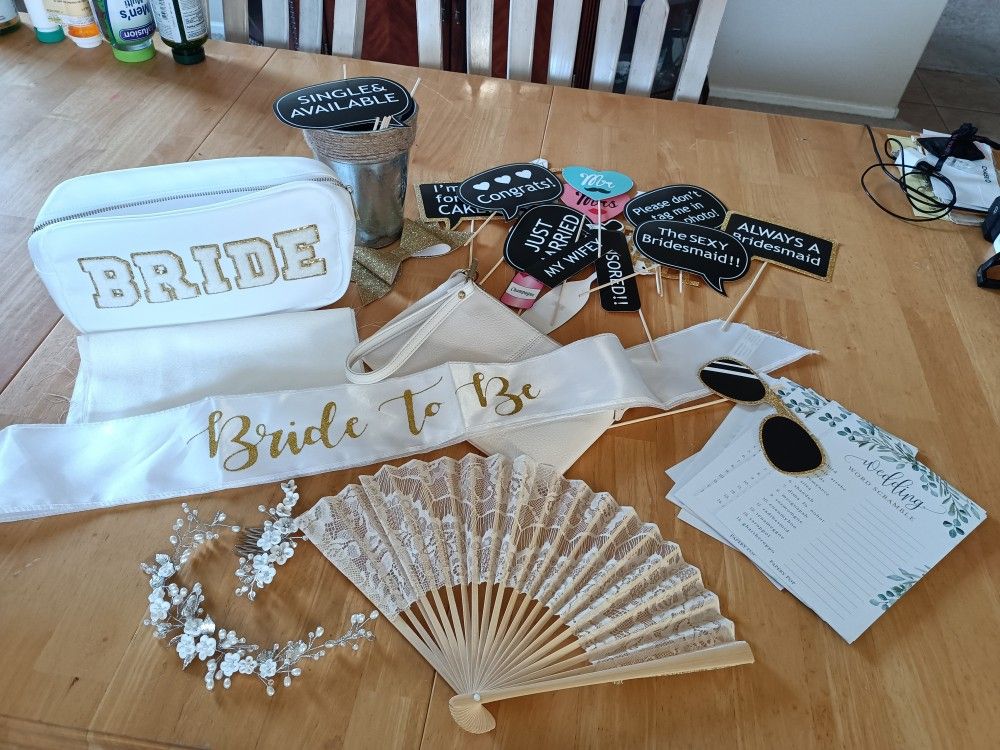 Bridal shower accessories paper parasol, lace fan, flower hair vine, shower quiz game, photo booth props, Bride sash, makeup bag & clutch purse
$20 f