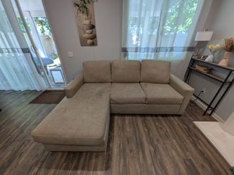 Mathers Mocha Faux Leather Sofa W/Reversible Chaise