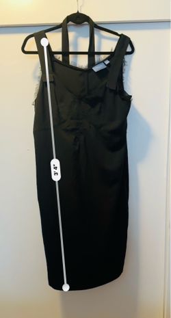 Vera wang dress with pockets and belt.