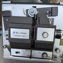 Movie projector eight and super eight auto feed