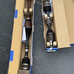 Toyota Camry 2016 SE Front Axle Shafts + Front Brake Rotors (Used – Set)