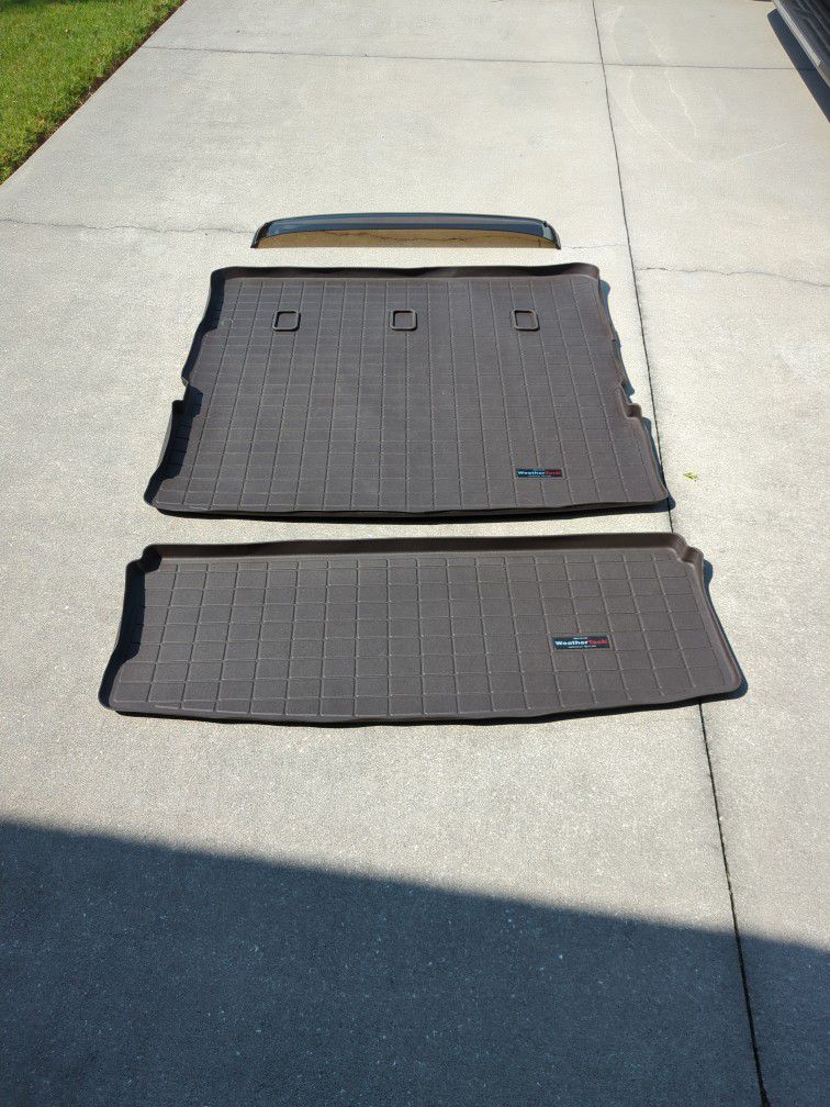 Rear Cargo Mats and Sunroof Visor For a Ford Expedition 