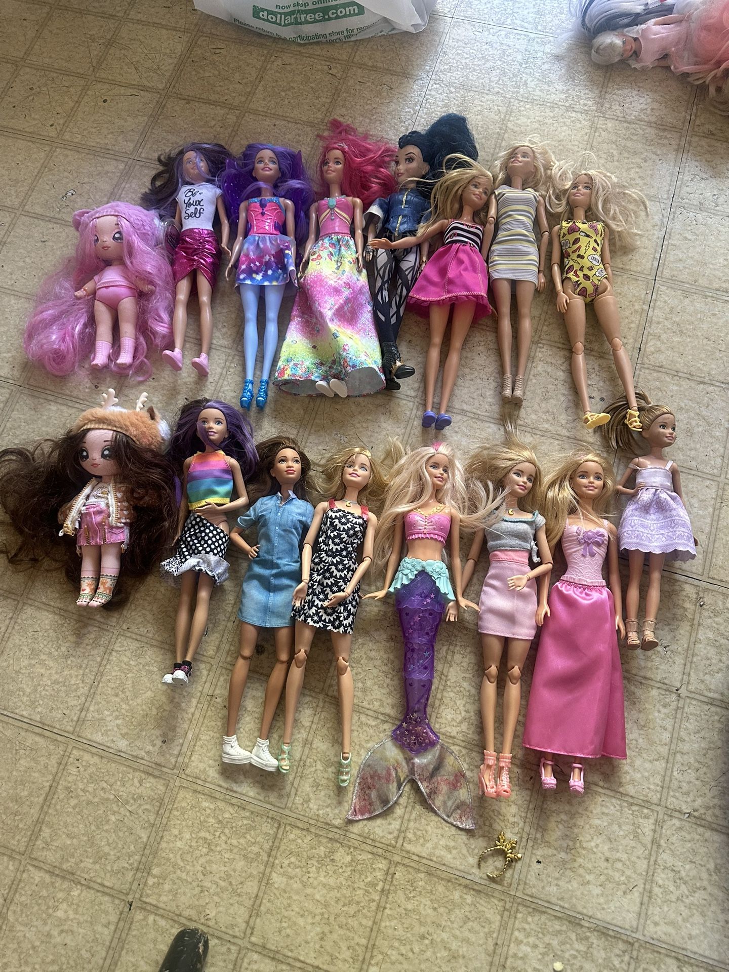 16 Barbie Dolls