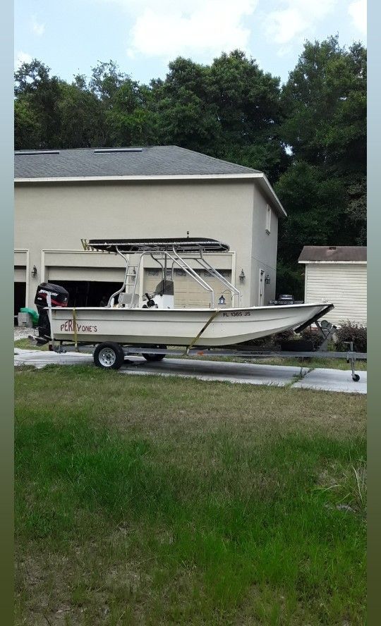 1997 custom Carolina skiff with 150 Merc