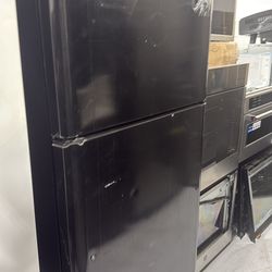 Brand new black 30 inch Frigidaire top and bottom refrigerator