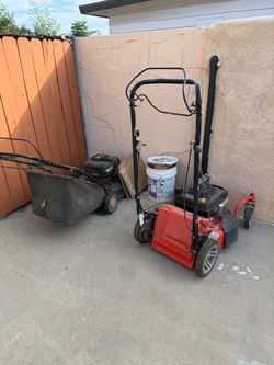 Two lawnmowers.