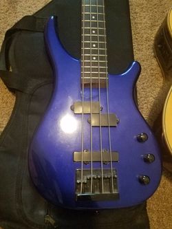 Bass and acoustic electric guitar, missing strings