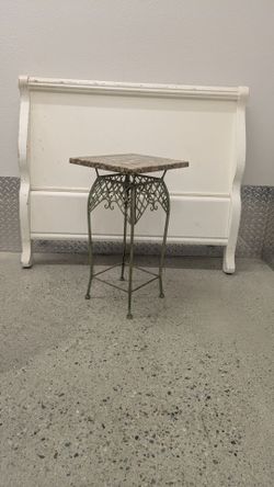 Small marbled night stand with metal base