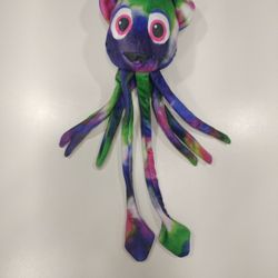 This is a Tuffy Ocean Creatures Squid dog toy in the Green/Kaleidoscope color.   ( Red / Black Bin )