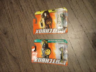 2 matchbox cars