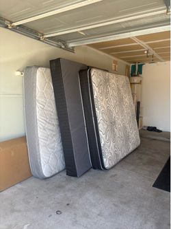 King mattress semi new, 2 kids bed semi new. All with box spring.