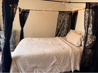 Black canopy bed frame: Queen