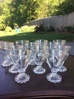 12 small glasses or candle voltives
