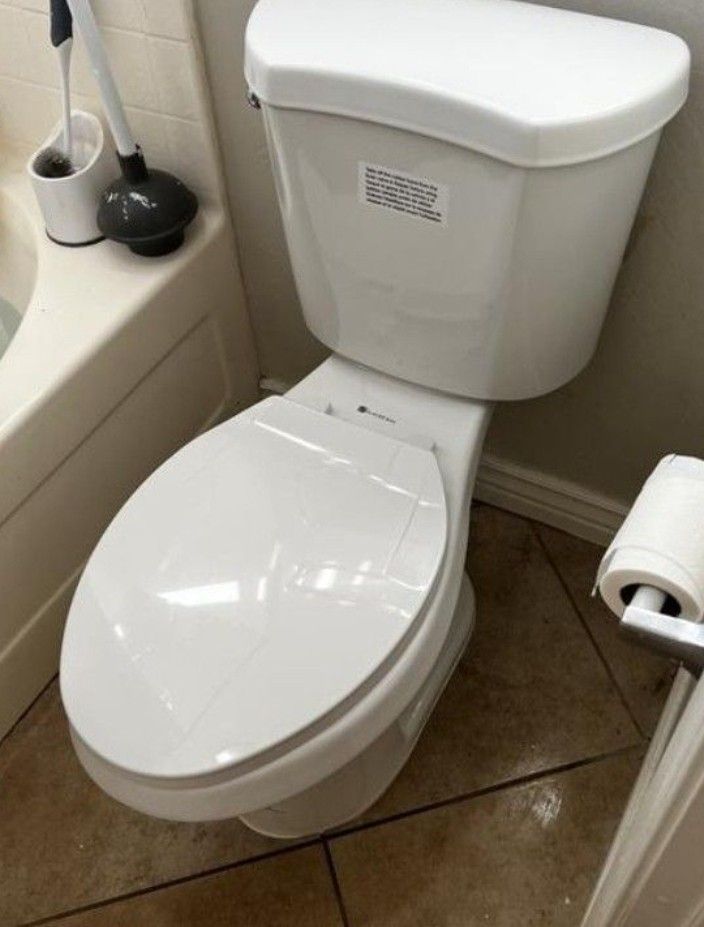 2 piece 1.28 GPF High Efficiency Single Flush Elongated Toilet in Bone