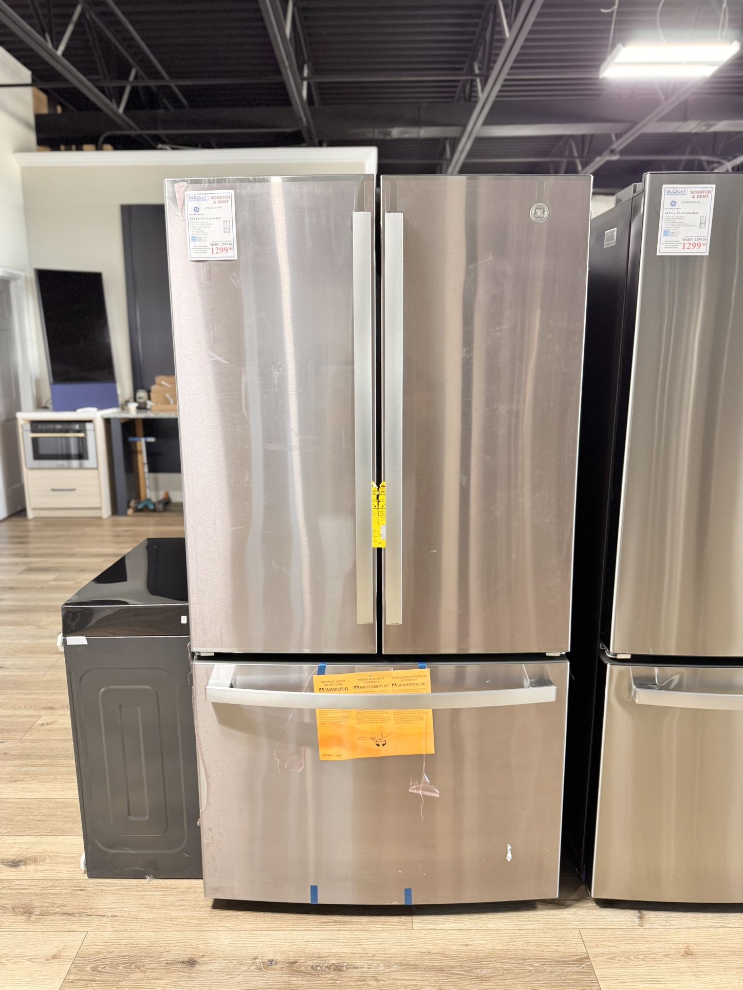 New GE 27.0 Cu. Ft. Fingerprint Resistant French-Door Refrigerator Model #:GNE27JYMFS