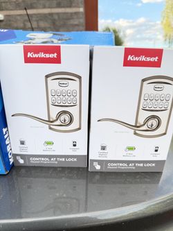 Brand-new Kwikset electronic keypad locks in their original boxes with a satin nickel finish. Convenient and secure keyless entry. Two units available