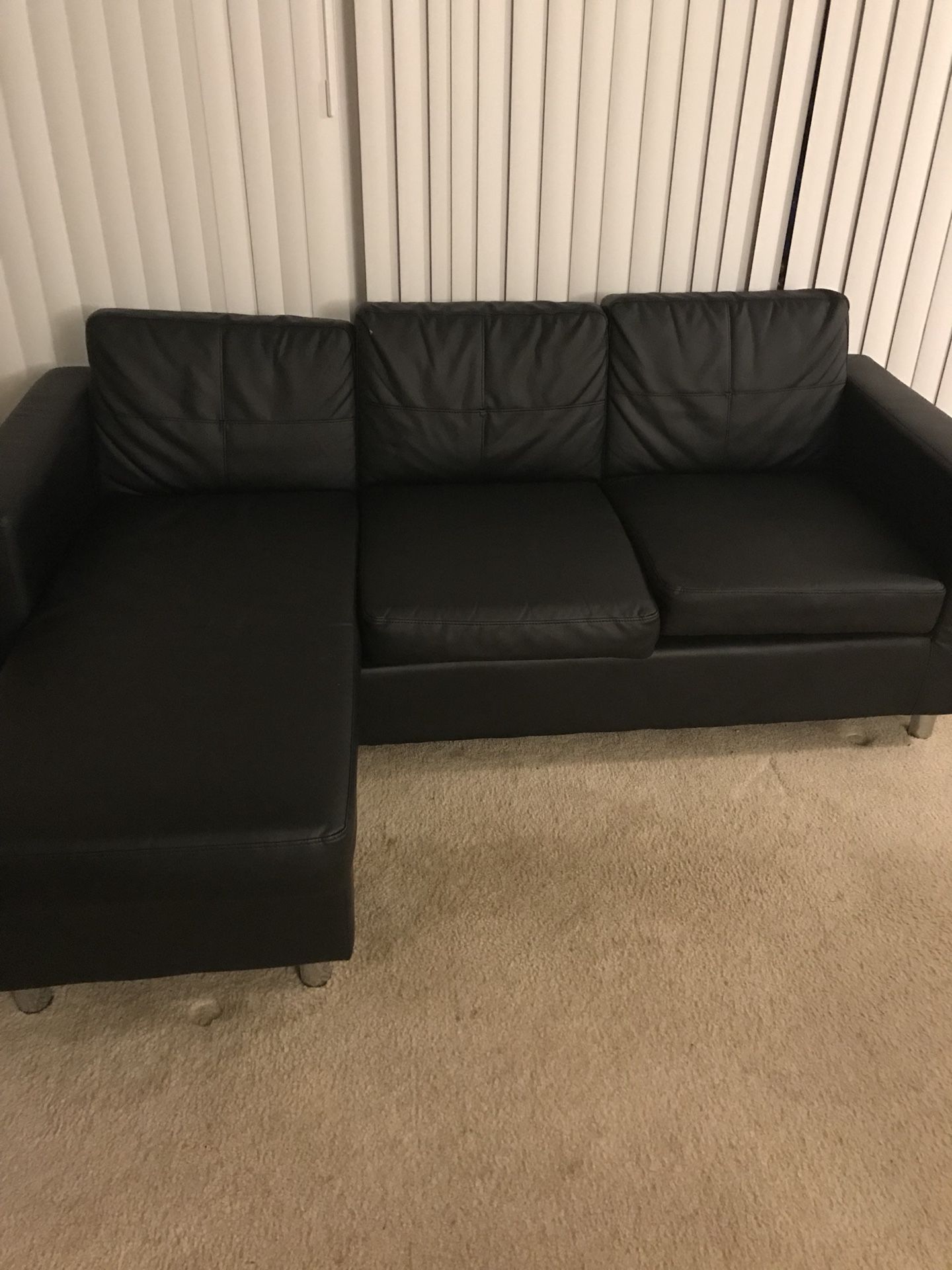 Black leather Sofa Good Condition