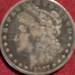1897 Silver Dollar Morgan $200.00. Good Condition