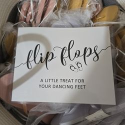 Assorted flip flops and sign