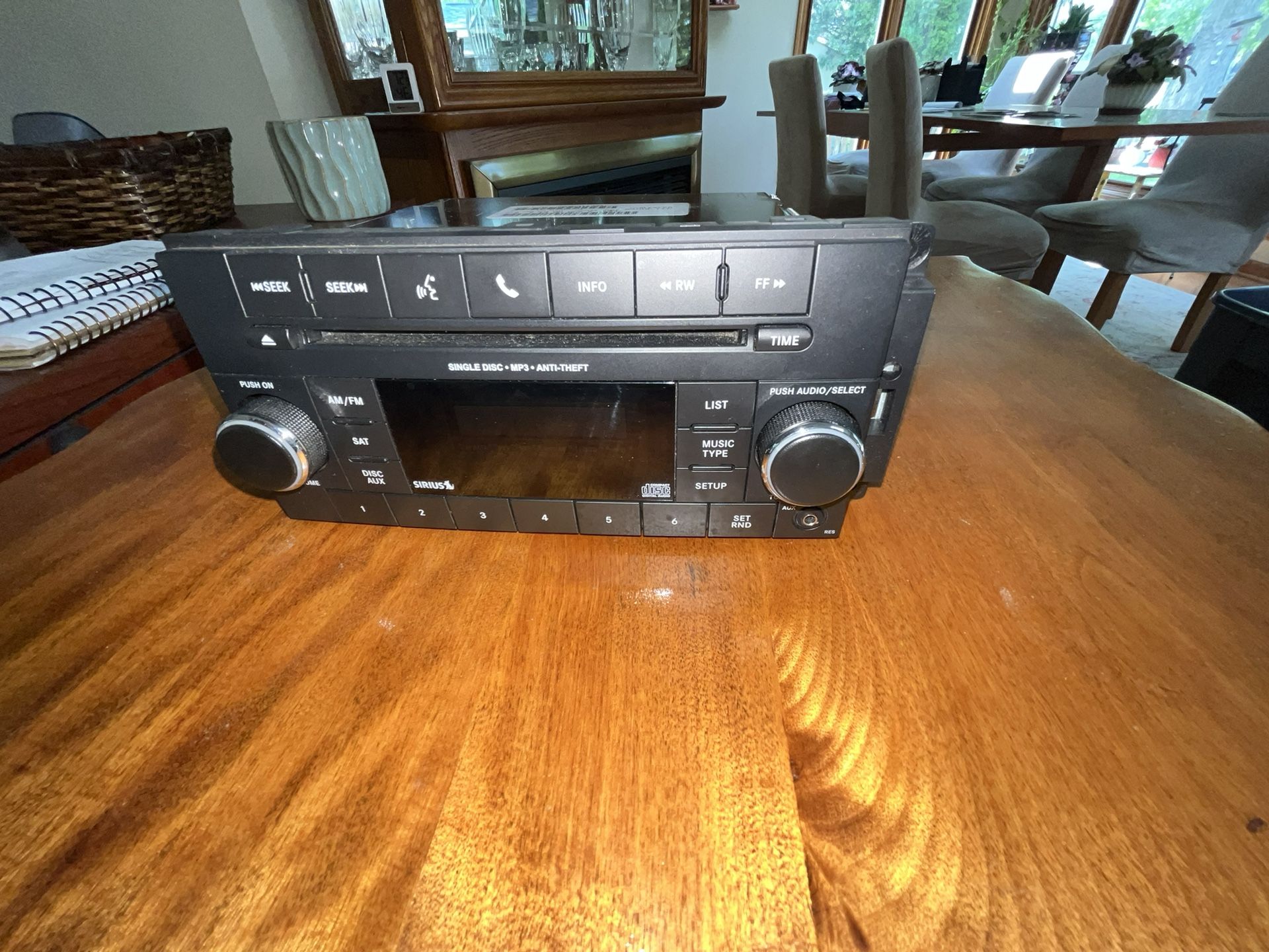 Chrysler stock radio part # P0(contact info removed)AC fits Chrysler Dodge & Jeep models CD disc MP3 anti theft SiriusXM
