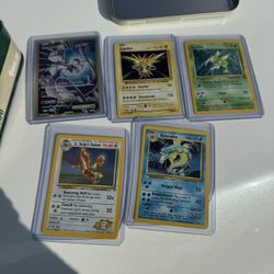 POKÉMON HITS. BASE SET HOLOS $50