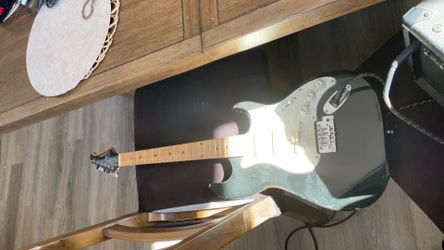 Guitar & amplifier $70 obo.