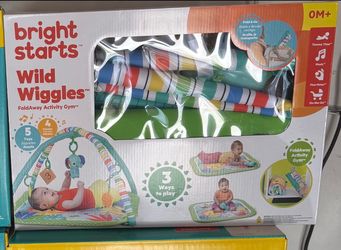 New baby activity gym sell or trade for Enfamil 12 o cans