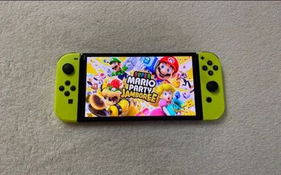 NINTENDO SWITCH OLED + 100 SWITCH GAMES and 7000 Classic Games